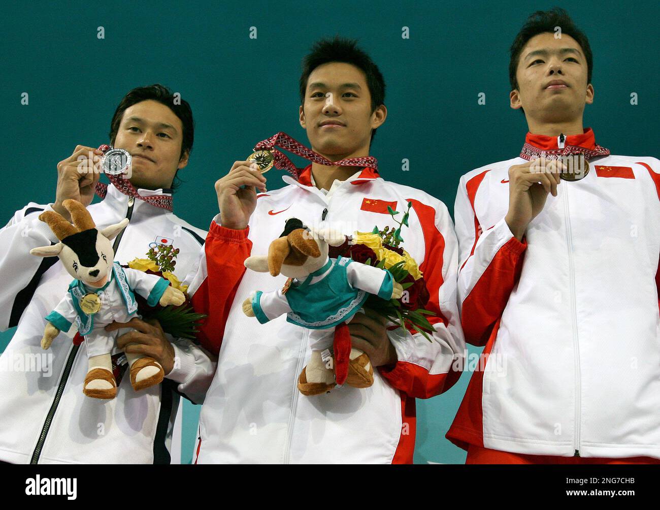 50m Ryo China's Zhou Jiawei, center, the gold medal winner, is flanked at left ...