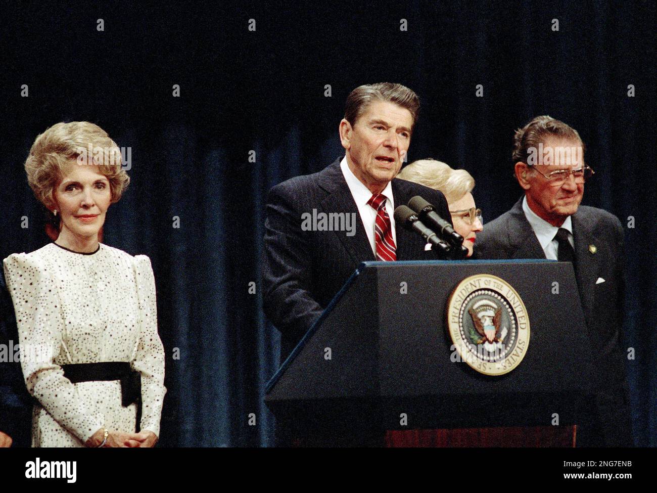 President Ronald Reagan on stage with his wife Nancy at Left, Nov. 6 ...