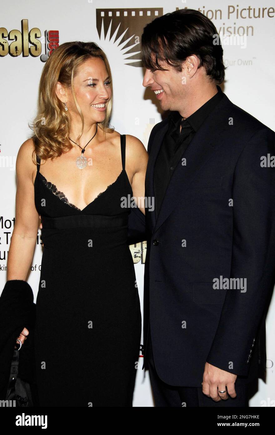 Singer Harry Connick Jr., right, and wife actress Jill Goodacre, left