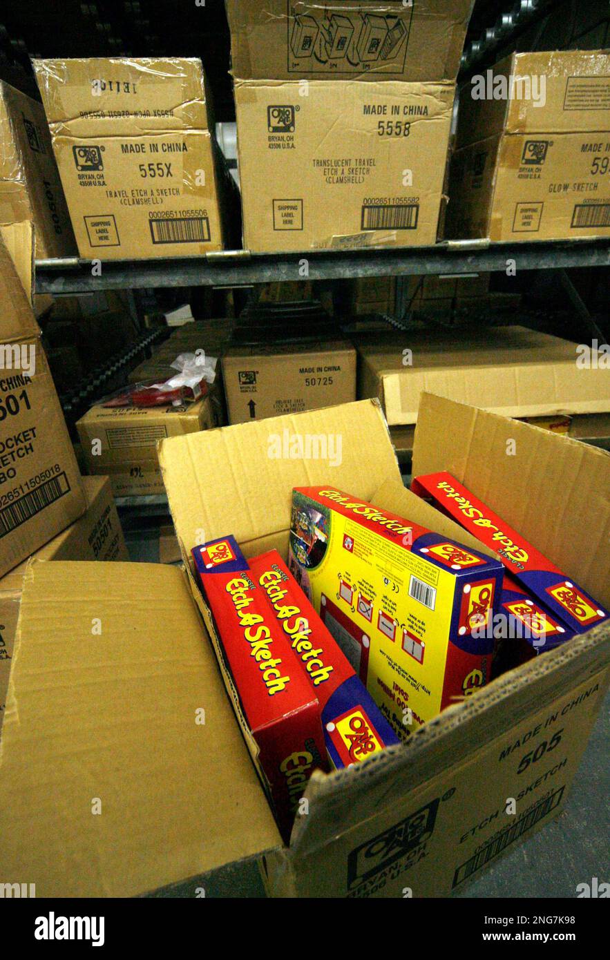 A view of an open box of Etch A Sketch, in a warehouse at The Ohio Art