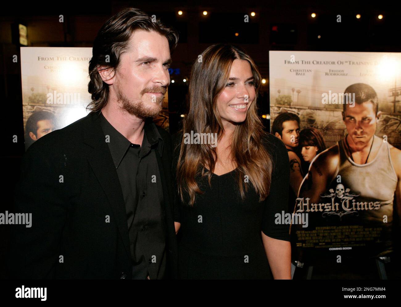 Actor Christian Bale, left, and his wife, Sibi Blazic, arrive at the
