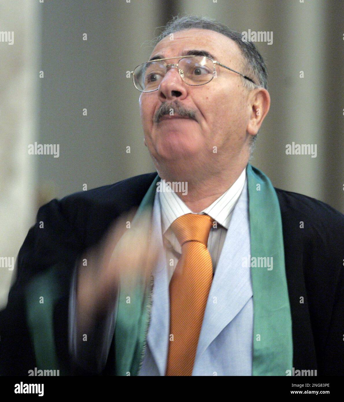 Defence lawyer Badie Aref argues with the chief judge during the trial