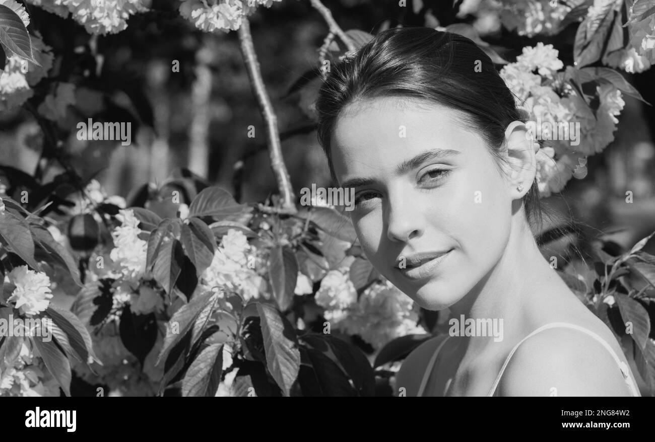 Girl in in blossoms cherry sakura. Outdoor portrait of beautiful ...