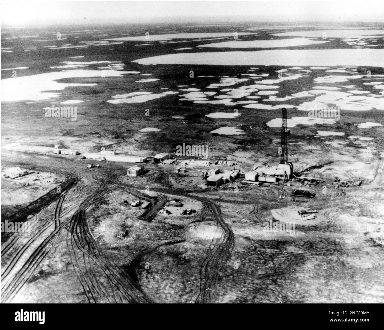 ** FILE ** This 1968 aerial view shows one of the first oil wells in