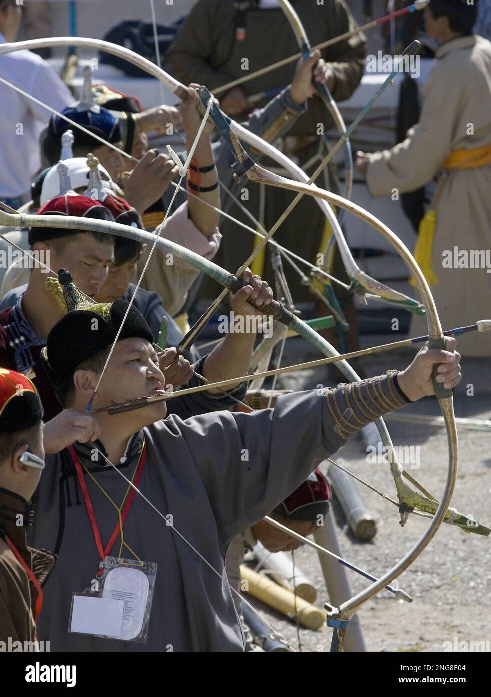 Mongolian archers practice before the opening of the archery competition as part of the annual