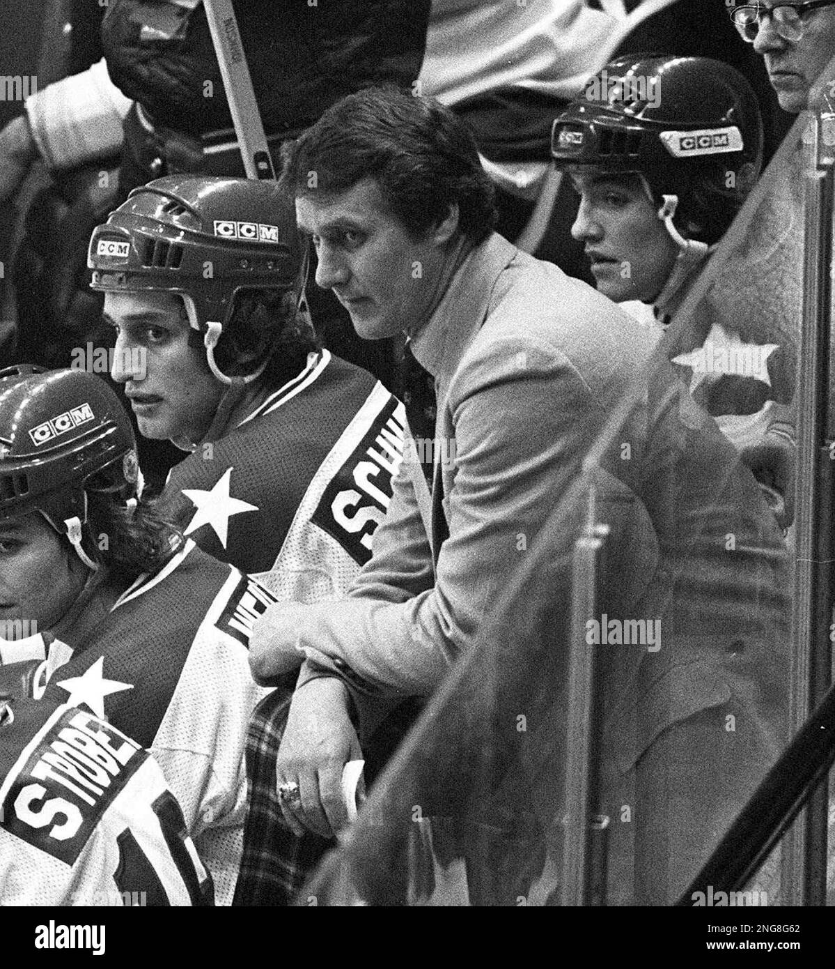 FILE ** USA coach Herb Brooks, center, looks on from the bench during the closing minutes of the semifinal game against the USSR at the 1980 Winter Olympic Games, in a