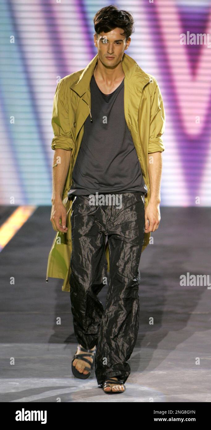 https://c8.alamy.com/comp/2NG8GYN/a-model-wears-an-outfit-part-of-gianni-versace-spring-summer-2007-mens-collection-unveiled-in-milan-italy-monday-june-26-2006-ap-photoantonio-calanni-2NG8GYN.jpg