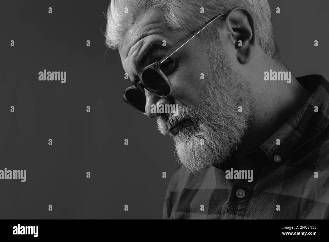 Close up face of a young man without emotions. Portrait of a happy man