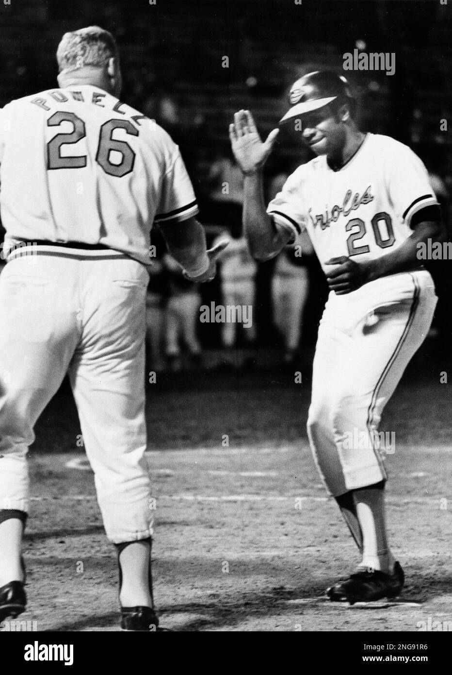 Baltimore Orioles outfielder Frank Robinson is congratulated at home plate  by teammate Boog Powell after hitting his 500th major league home run  during game against Detroit Tigers in Baltimore, Md., Sept. 13