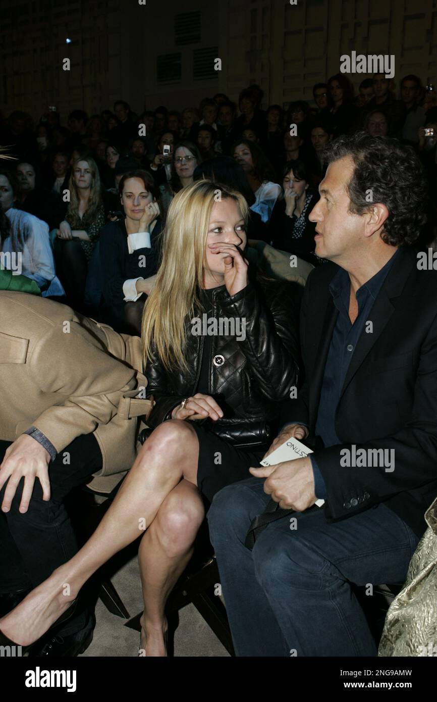 Model Kate Moss and Mario Testino are shown at the Burberry