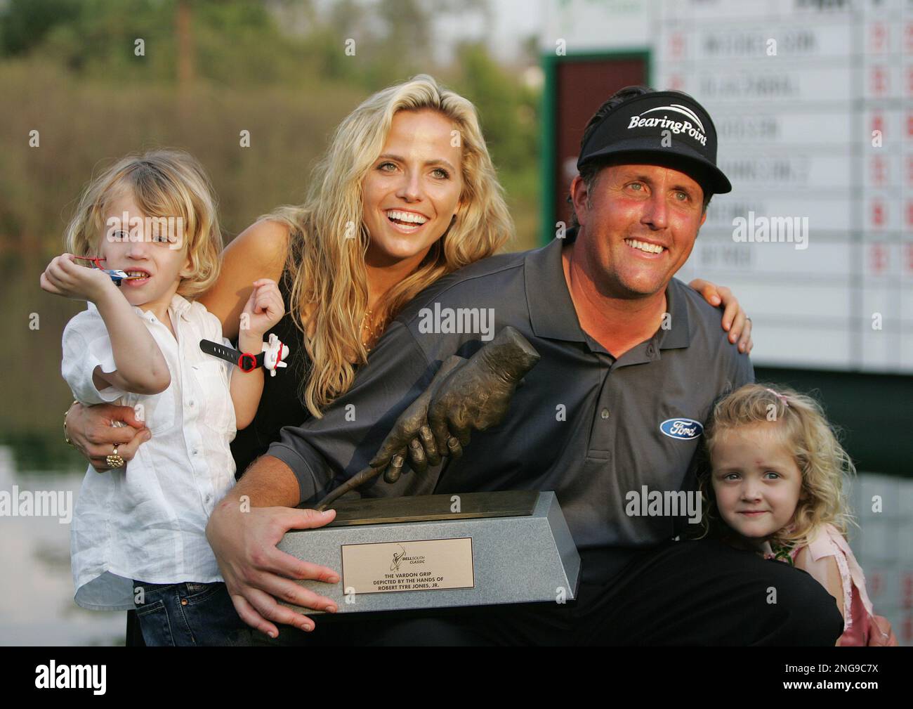 Phil Mickelson is photographed with wife, Amy, son, Evan, 3, left, and
