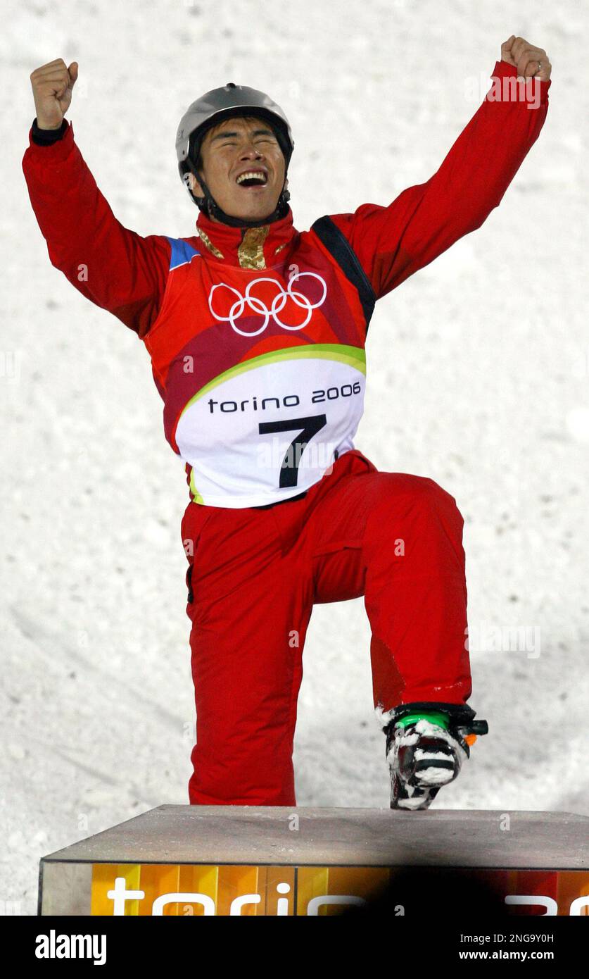 China's Xiaopeng Han celebrates after clinching the gold medal in Men's
