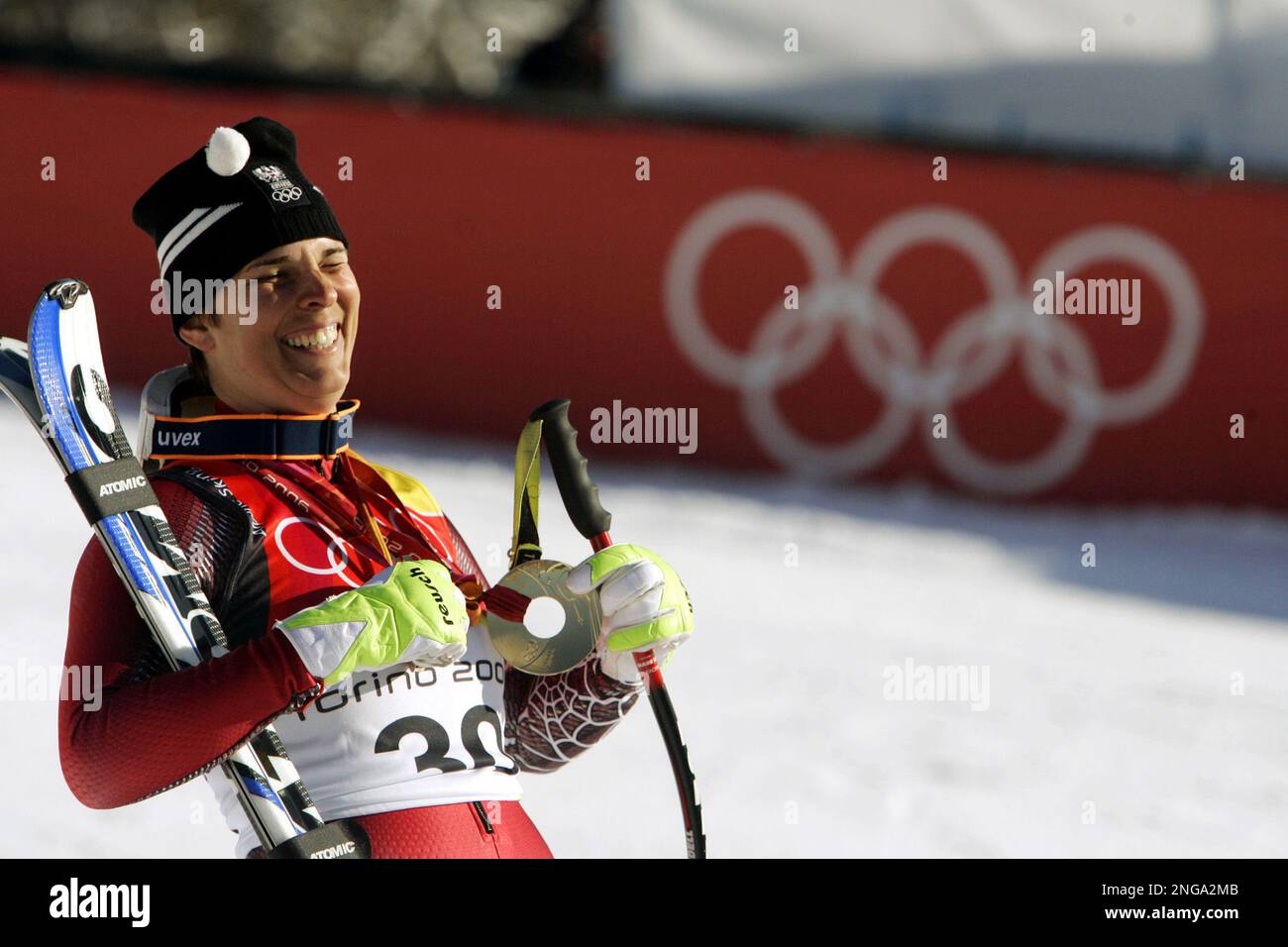 Michaela Dorfmeister of Austria shows her gold medals of the Women's