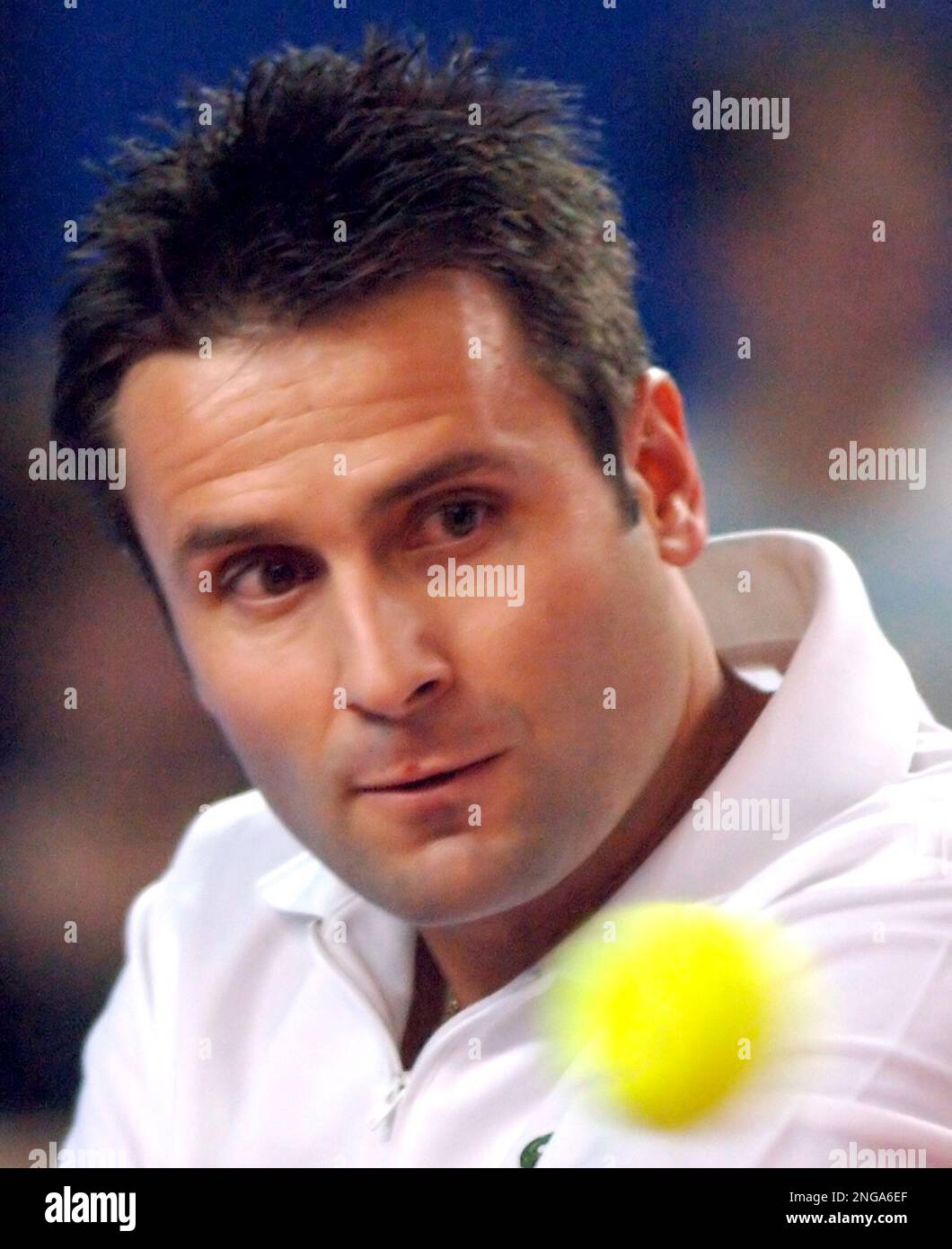 Fabrice Santoro of France returns to Arnaud Clement of France during