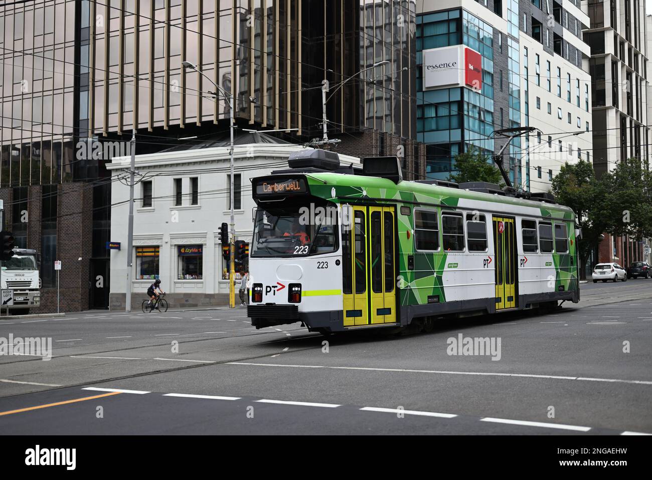 Camberwell-bound Z-class tram, operated by Yarra Trams and PTV, as it crosses an intersection in inner Melbourne Stock Photo