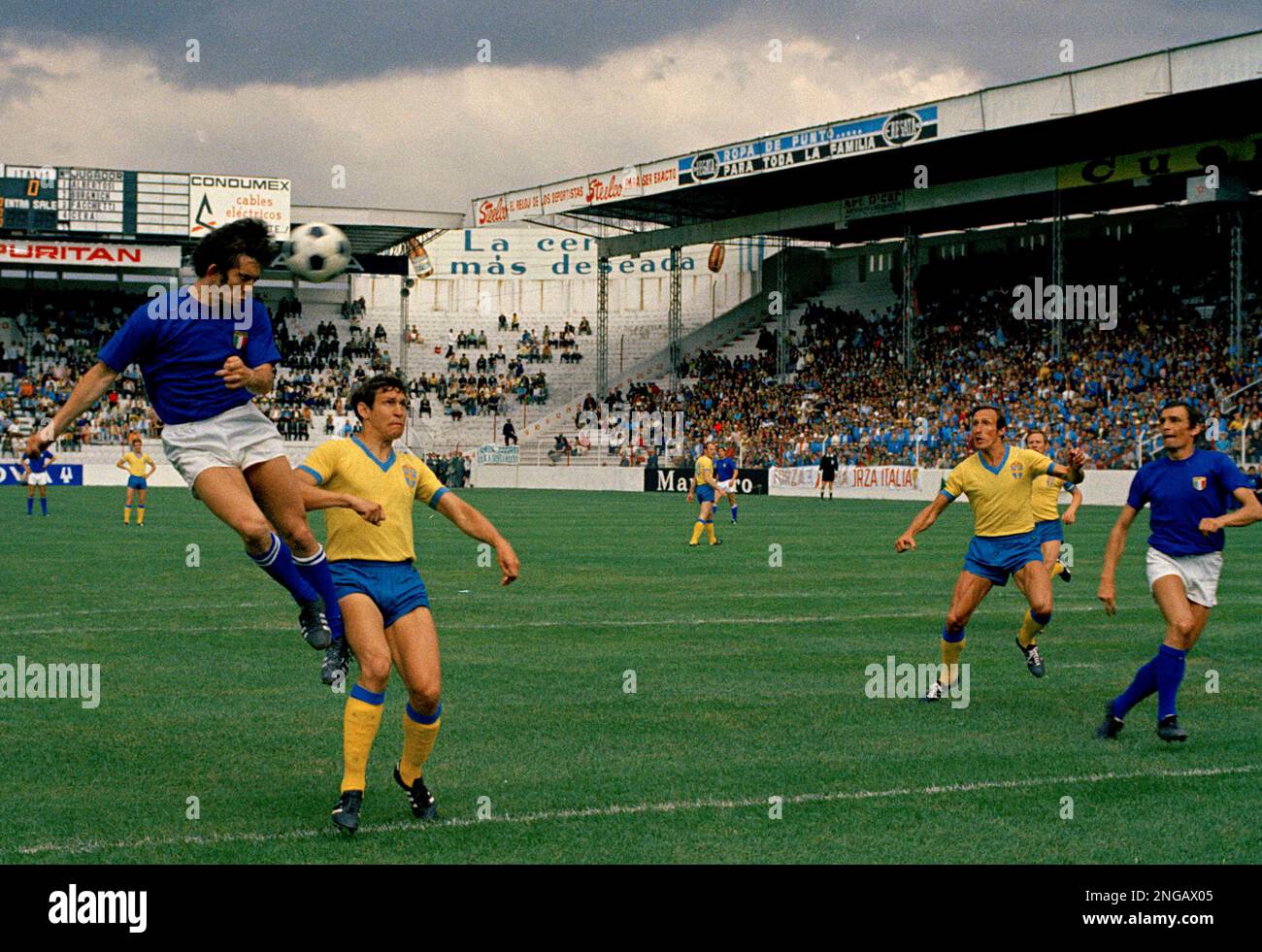 Italy attacks Sweden's goal during the World Cup Finals Group B match ...