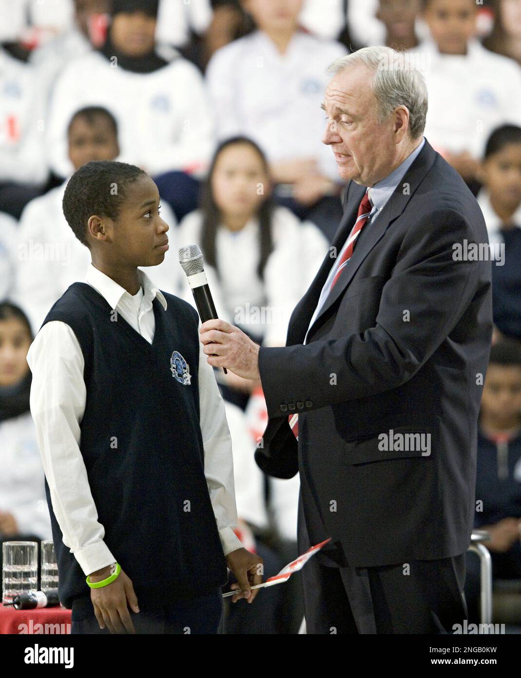 Canadian Prime Minister Paul Martin speaks with Tyrel Russell, 12