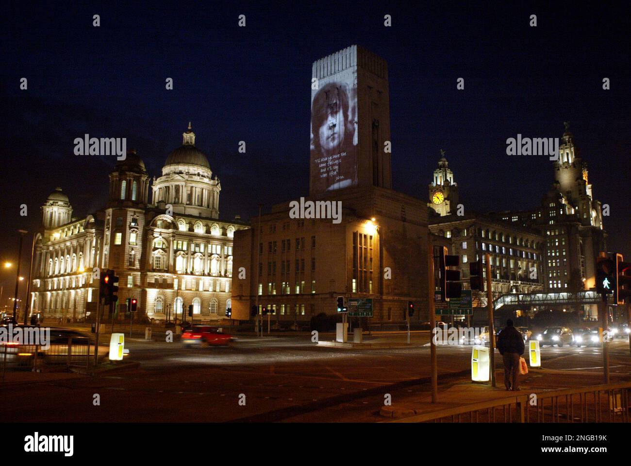 Images of John Lennon are projected onto the side of the Mersey Tunnel