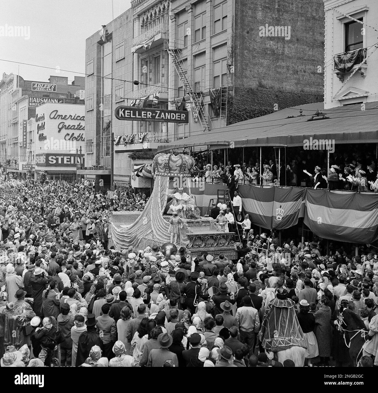 Rex, King of Carnival, turns to toast the crowd on Canal street after