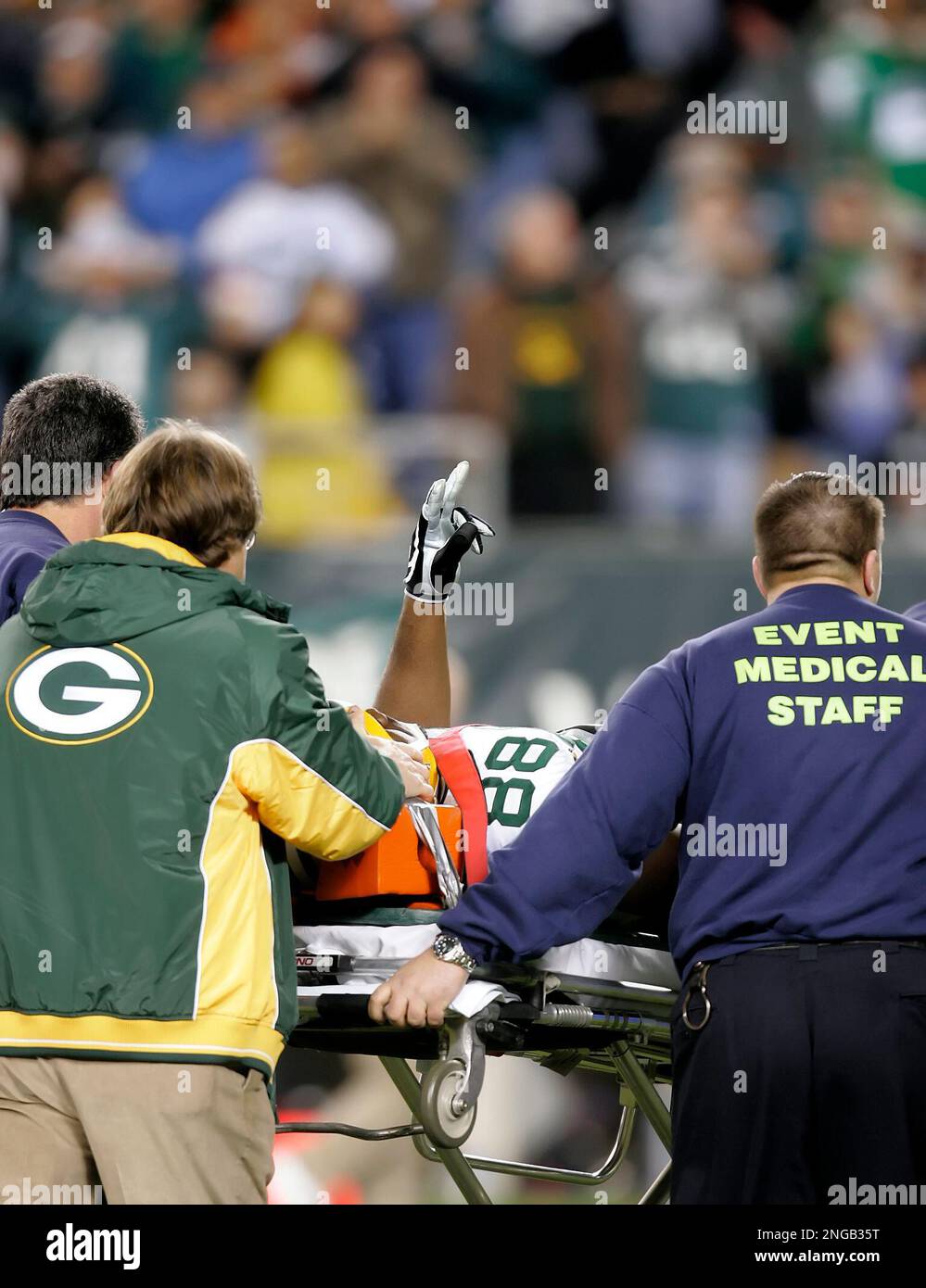 Green Bay Packers tight end Bubba Franks is carried off the field on a  stretcher after a hard hit from Eagles safety Brian Dawkins on an  incomplete pass early in the second