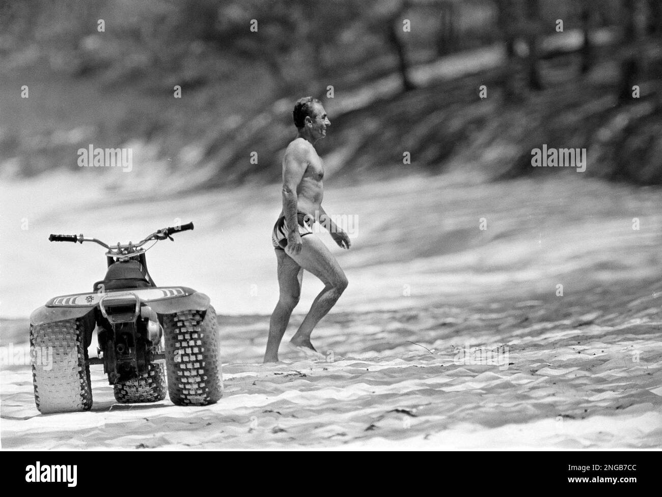 The deposed Shah of Iran is seen on the beach in the Bahamas, March 30