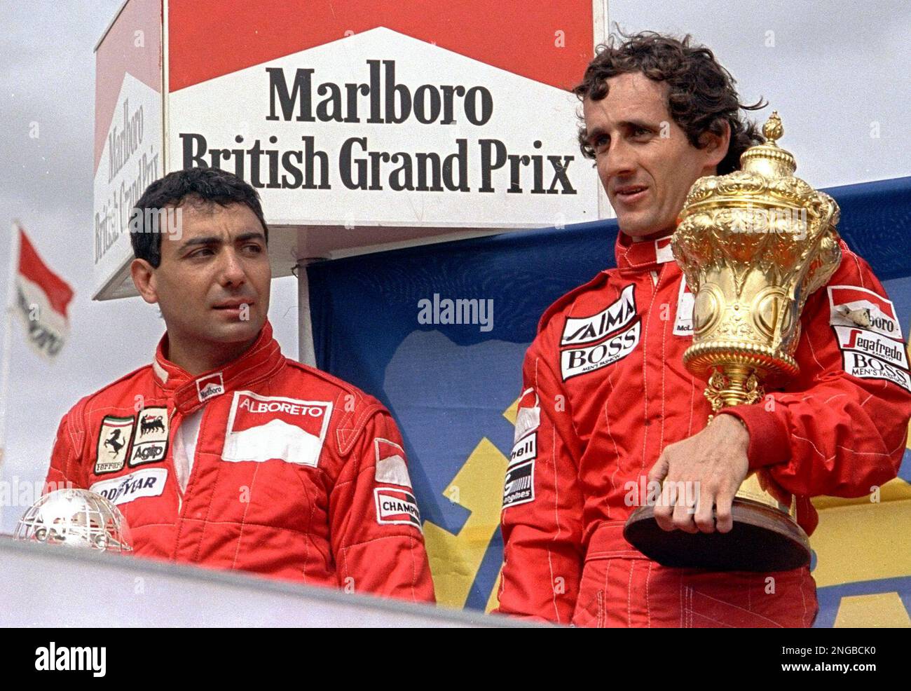 Ferrari F1 driver Michele Alboreto of Italy left is seen next to