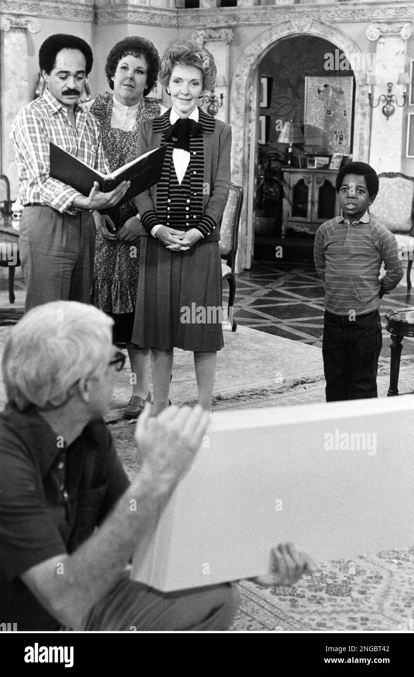 First Lady Nancy Reagan goes over cue cards on the set of the ...