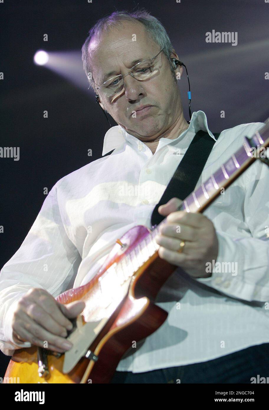 Songwriter and Dire Straits lead guitarist Mark Knopfler performs at a