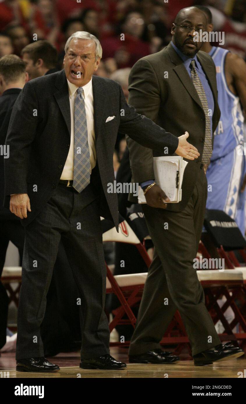 North Carolina head coach Roy Williams, left, yells at a referee as