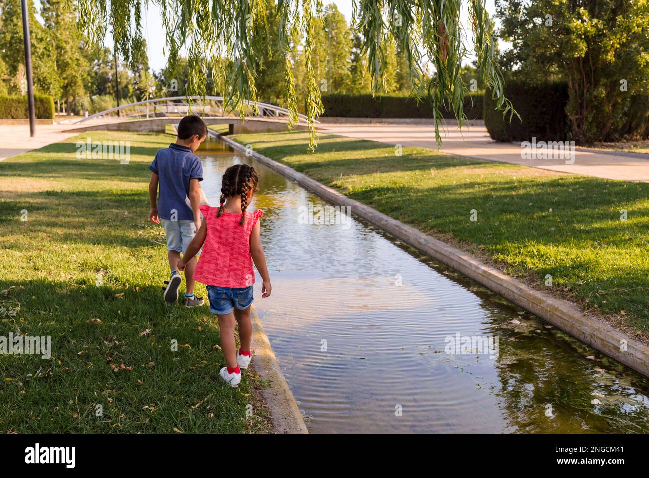 Brother and sister enjoying a day in the park together Stock Photo - Alamy