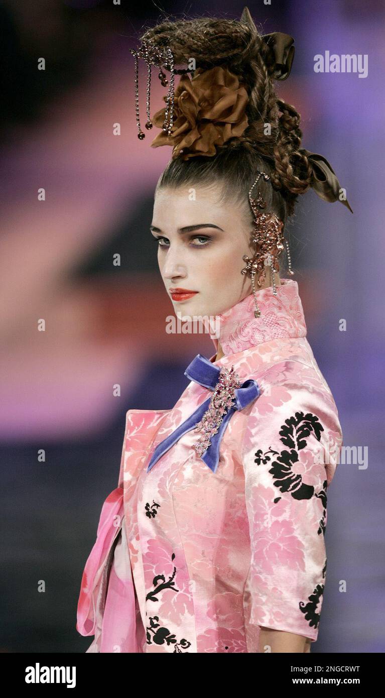 A model shows a creation for French fashion designer Christian Lacroix