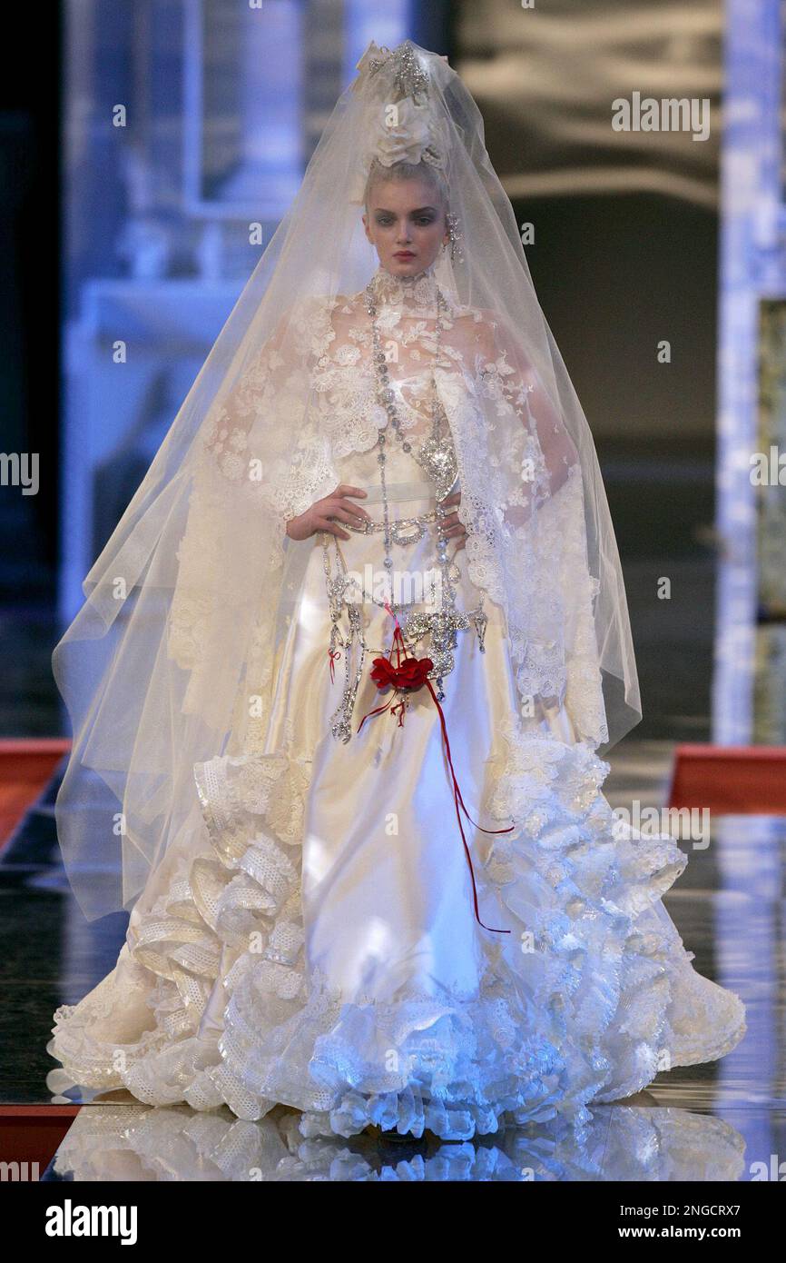 A model shows a wedding gown for French fashion designer Christian Lacroix'  spring-summer 2005 haute couture fashion collection presented in Paris,  Tuesday, Jan. 25, 2005. LVMH Moet Hennessy Louis Vuitton SA has