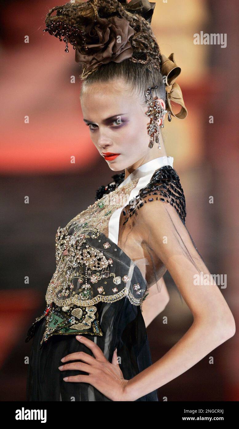 A model shows creations for French fashion designer Christian Lacroix'  spring-summer 2005 haute couture fashion collection presented in Paris,  Tuesday, Jan. 25, 2005. LVMH Moet Hennessy Louis Vuitton SA has sold its