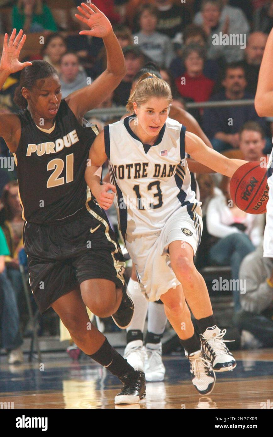 Notre Dame guard Megan Duffy (13) heads up court while Purdue guard