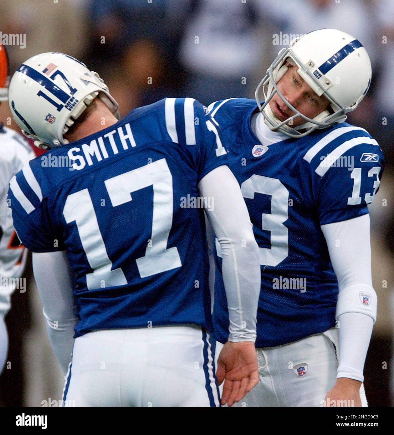 Indianapolis Colts kicker Mike Vanderjagt, right, celebrates with hold Hunter Smith after a field goal in the second half of the AFC wild-card game in Indianapolis, Sunday, Jan