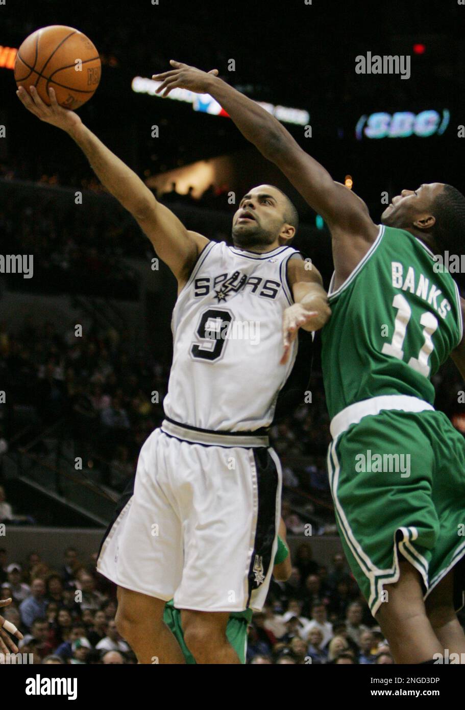 San Antonio Spurs guard Tony Parker (9) of France drives to the basket as  Boston Celtics guard Marcus Banks defends during the first quarter in San  Antonio Sunday, Dec. 26, 2004. (AP