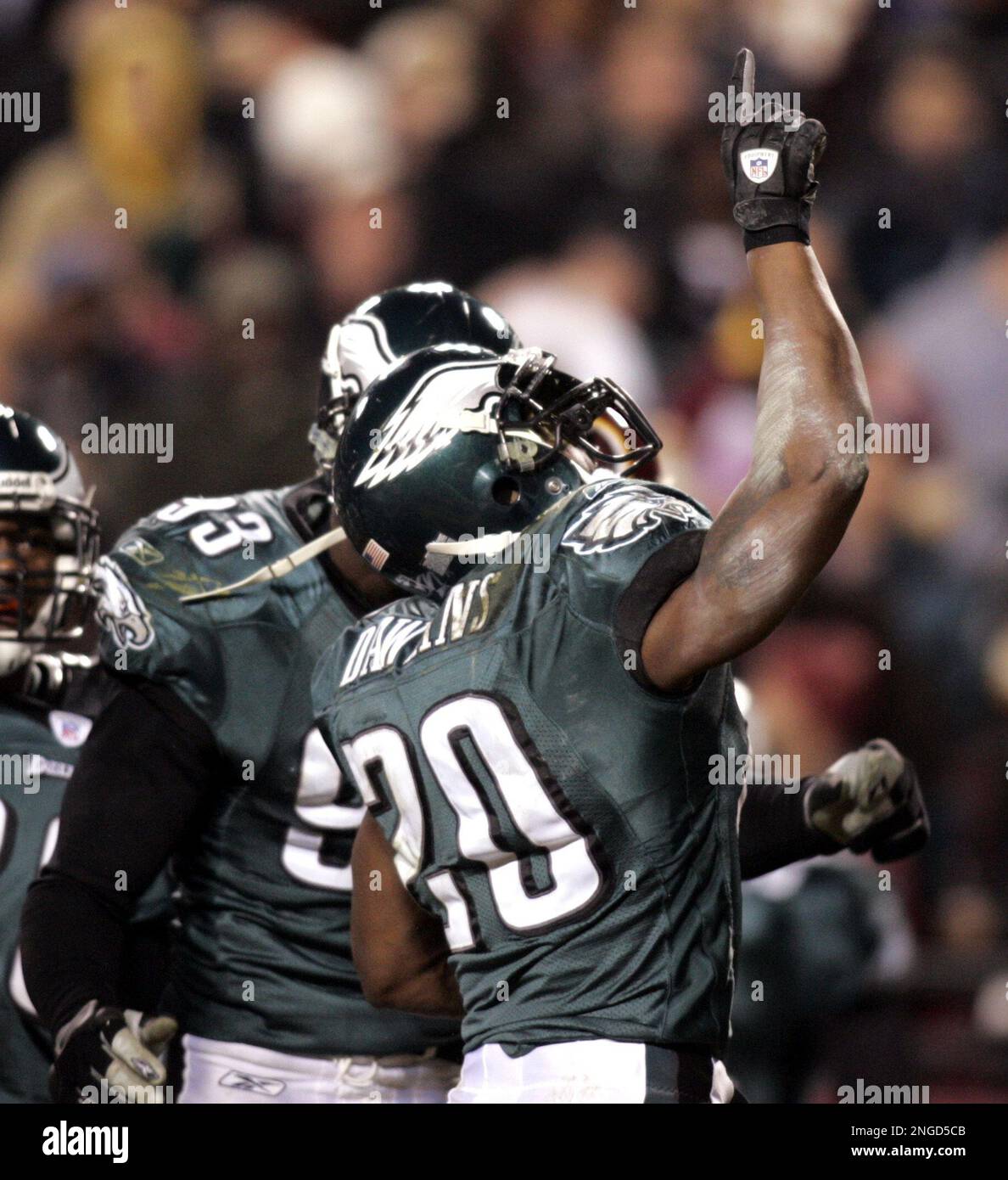 Brian Dawkins of the Philadelphia Eagles celebrates his fourth quarter  interception of the Redskins Patrick Ramsey with 1:07 to play in the Eagles  17-14 win on Sunday December 12, 2004 at Fed