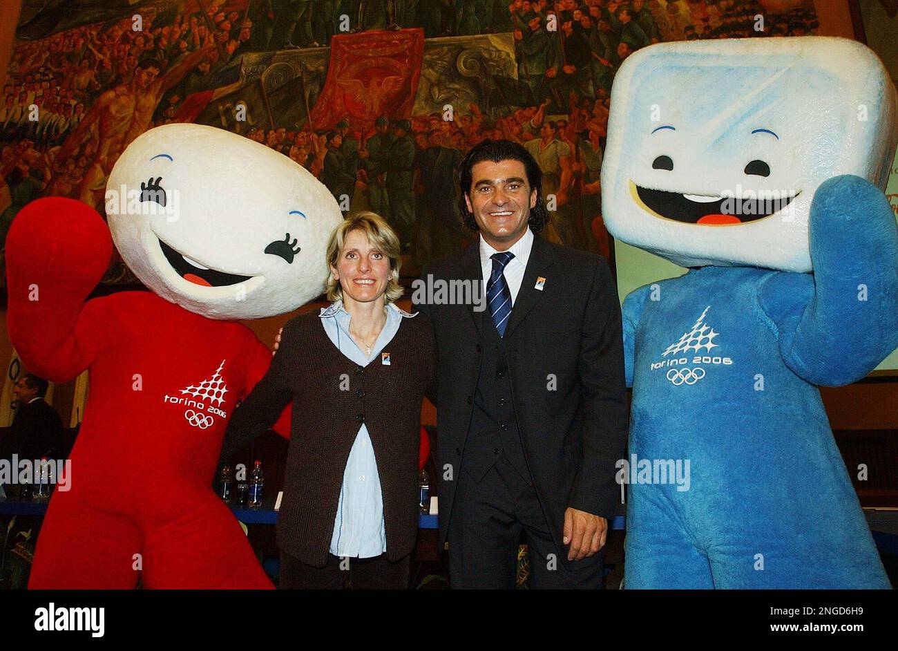 Stefania Belmondo, Alberto Tomba pose with the olympic mascots Neve, at  left, and Glitz, in Rome, Tuesday, Dec. 7, 2004. The torch relay for the  2006 Winter Olympic in Turin will go, image size:1300x942
