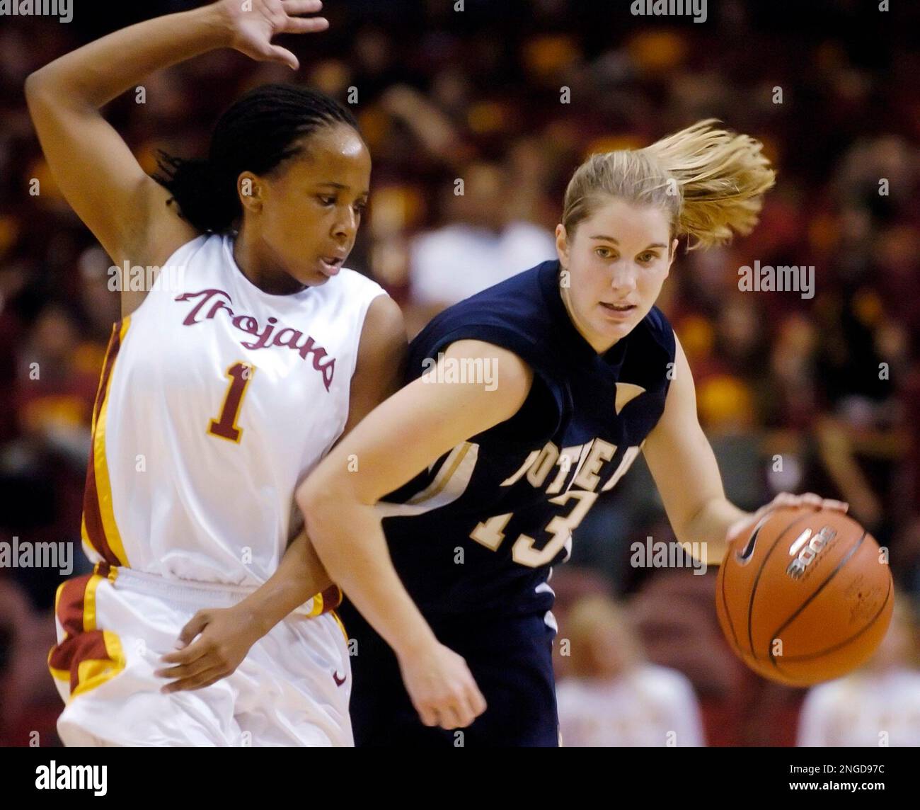 Notre Dame's Megan Duffy, right, drives past Southern California's