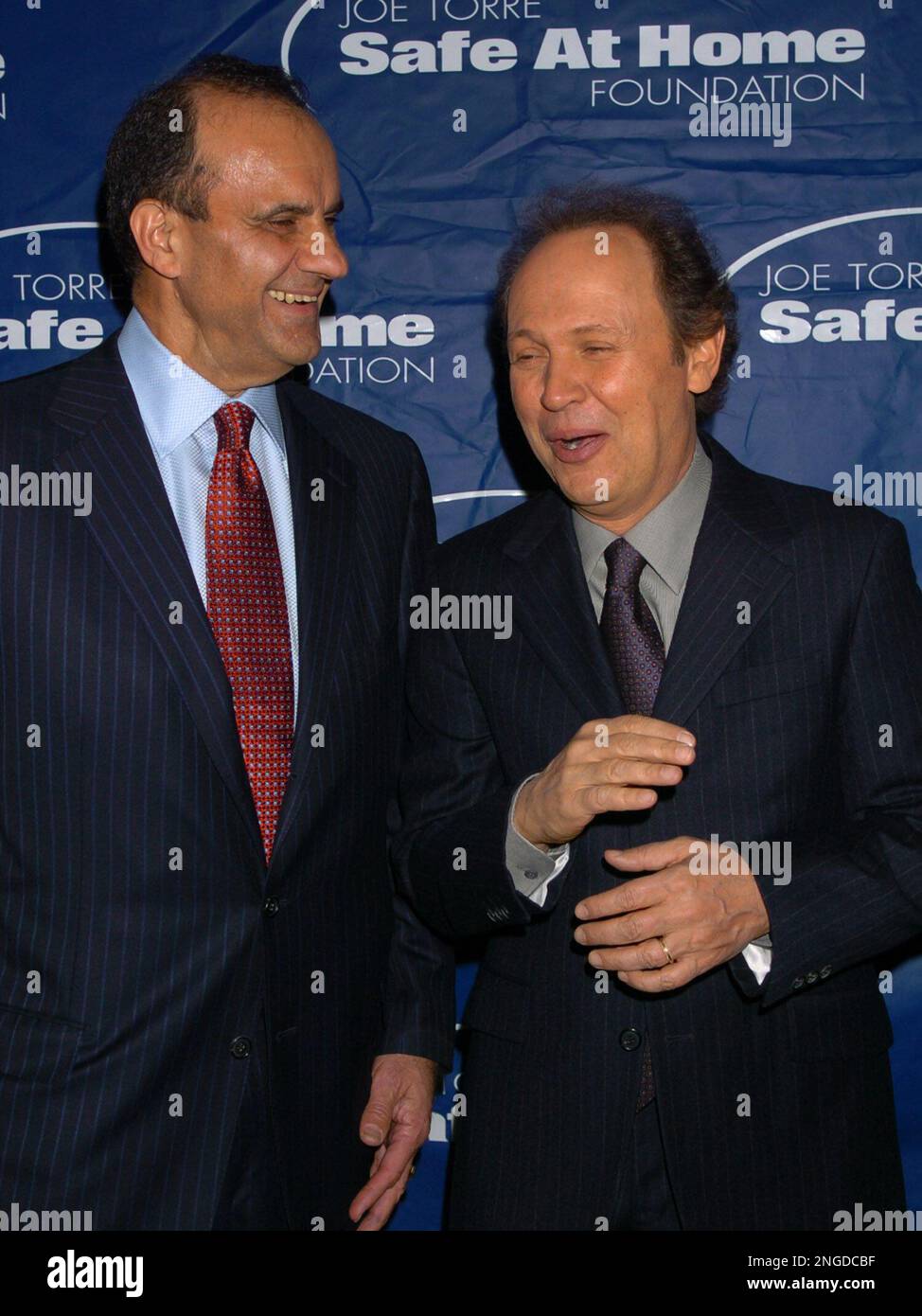 New York Yankees manager Joe Torre, left, and actor Billy Crystal