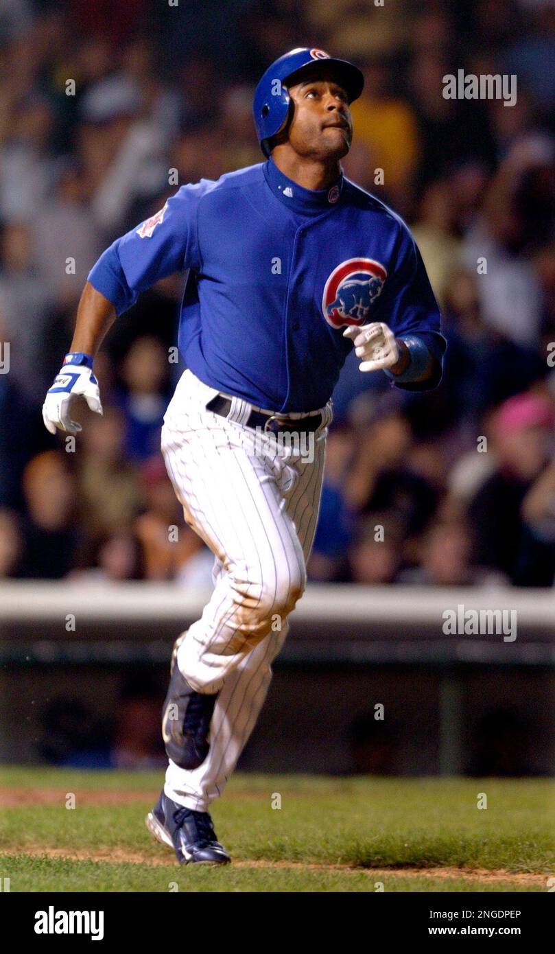 Chicago Cubs' Corey Patterson watches his two-run homer fly out of