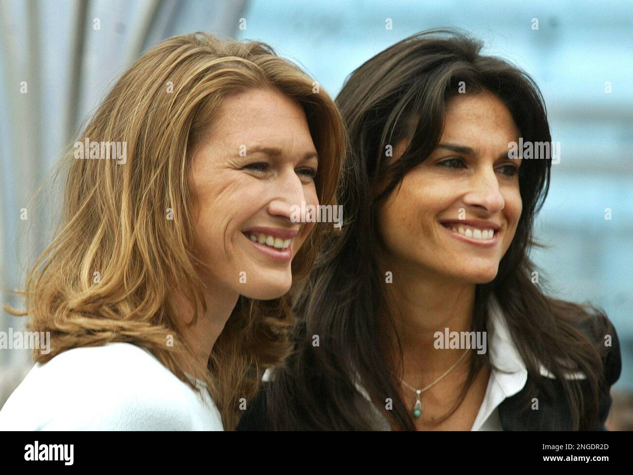 Tennis stars Steffi Graf from Germany and Gabriela Sabatini from Argentina  pose during a ceremony at the center court of the LTTC Rot-Weiss tennis  club, which was renamed in "Steffi-Graf-Stadion" stadium on