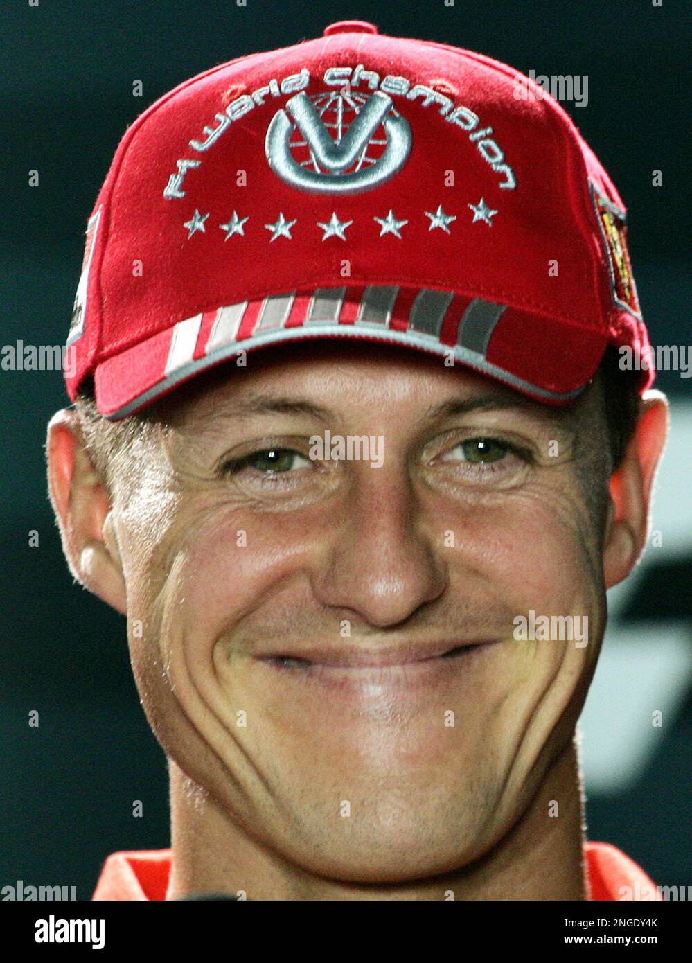 Ferrari driver Michael Schumacher of Germany, smiles during a press