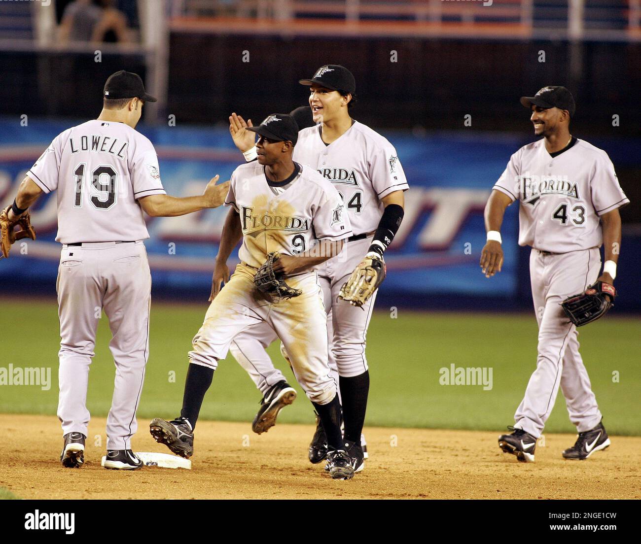 Florida Marlins from left, Mike Lowell, Juan Pierre, MIguel