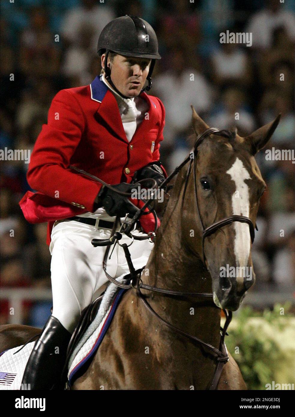 McLain Ward of the USA tries to regain control of his horse Sapphire