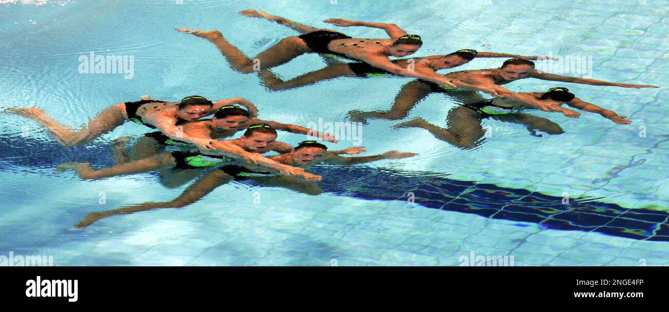 Members of the United States synchronized swimming team perform in the team event technical routine in the Olympic Aquatic Center at the 2004 Olympic Games in Athens, Thursday Aug