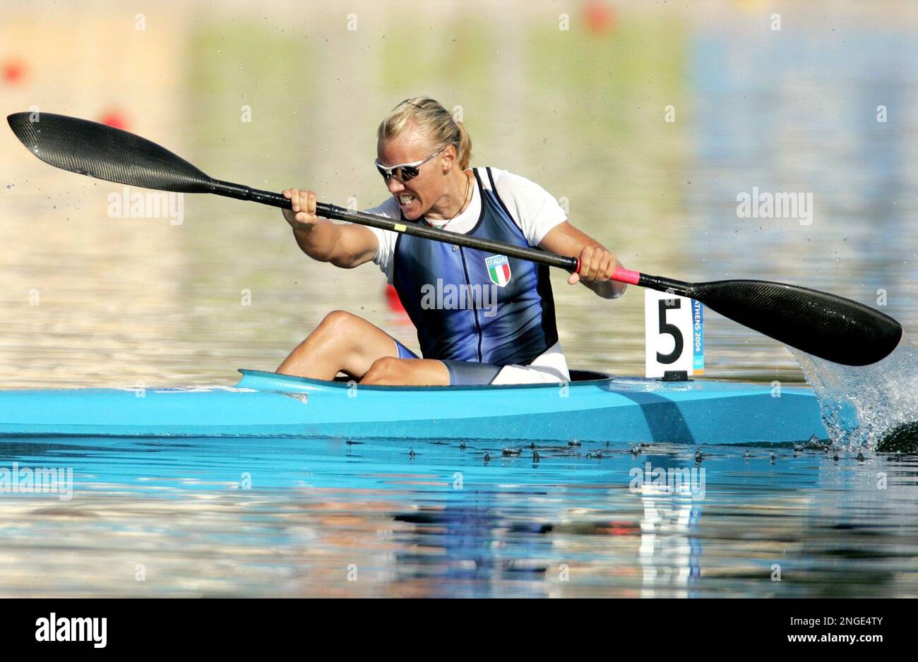 Defending Olympic champion Josefa Idem of Italy paddles to victory in her Women's K1 500 meter semifinal, during the kayak flatwater event at the 2004 Olympic Games in Schinias near Athens, Greece, Thursday, Aug. 26, 2004. (AP Photo/David Guttenfelder) Stock Photo