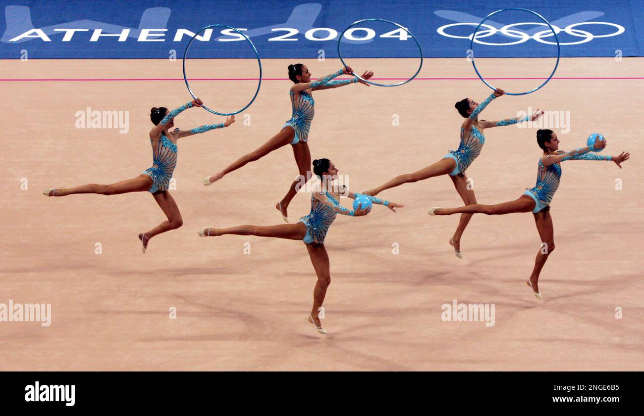 Italy team performs with hoops and balls during a practice session of