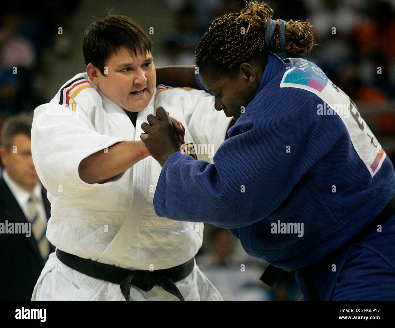 Joint-heaviest woman competitor Germany's Sandra Koeppen, in white ...