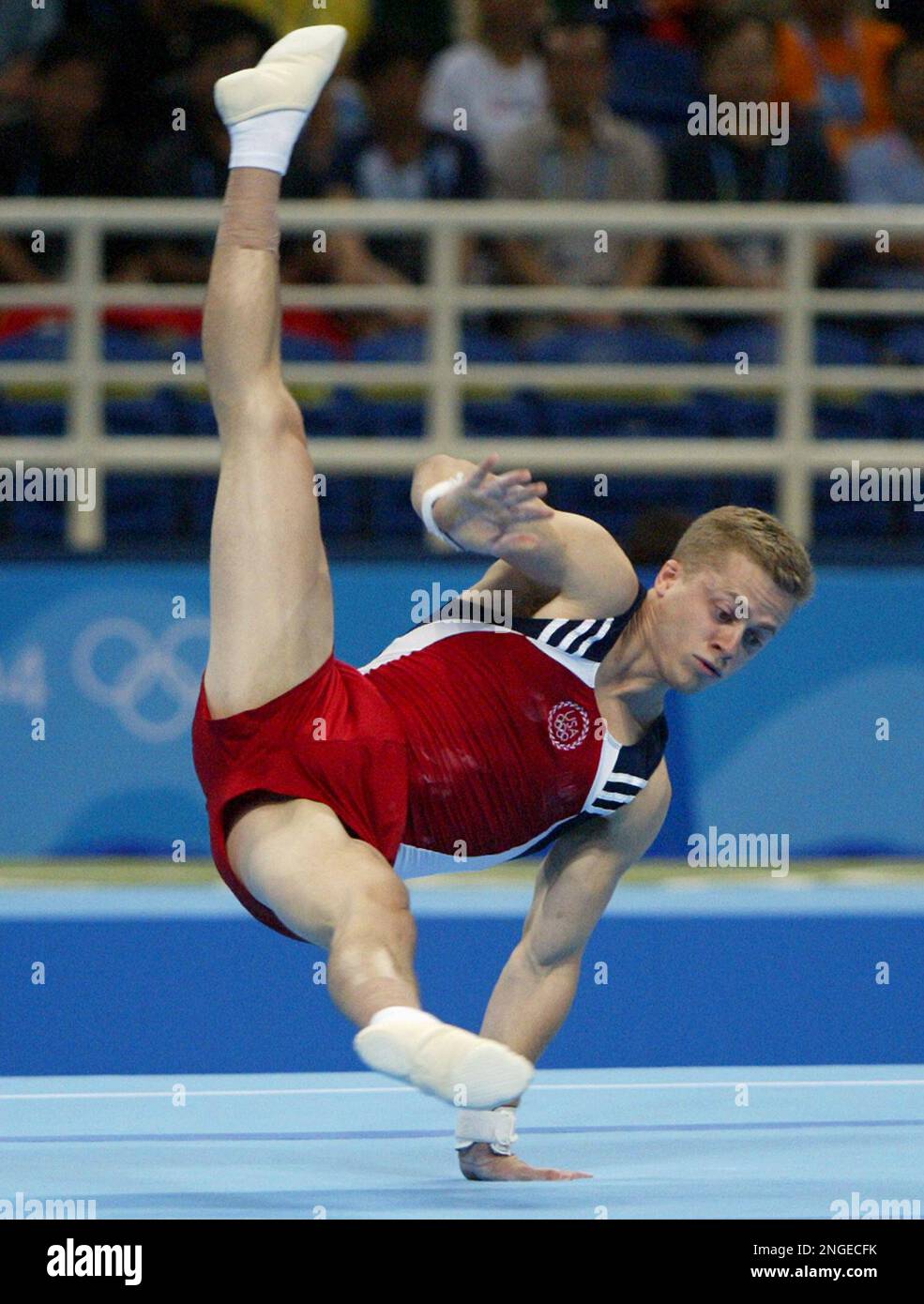 Unite States' Guard Young performs his floor routine during the men's